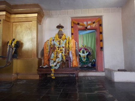 Photo for Huliyurdurga, Karnataka, India-Nov 14 2023: Closeup of beautiful Lord Venkateshwara Utsav metal statue and goddess Lakshmi temple. - Royalty Free Image