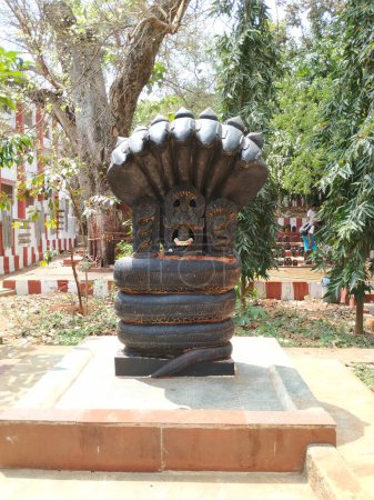 Closeup of beautiful small and big size Naga or Cobra Snake Statue at the Kadu Malleshwara Temple, Malleshwaram.