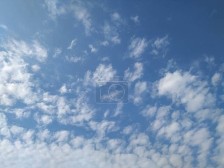 Closeup of Dramatic White Clouds in a Blue Sky Background. Heavenly feeling white Cloud in a summer season at mid day.
