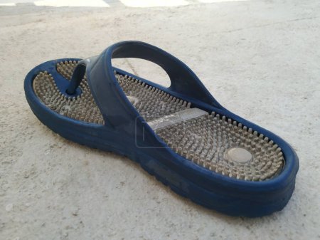 Photo for Bangalore, Karnataka, India-Mar 21 2020: Blue and White Color diabetic or acupressure slipper. - Royalty Free Image