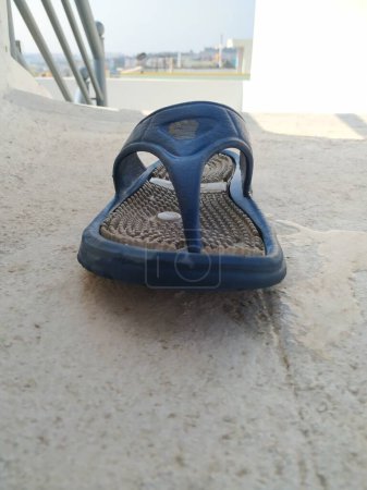 Photo for Bangalore, Karnataka, India-Mar 21 2020: Blue and White Color diabetic or acupressure slipper. - Royalty Free Image