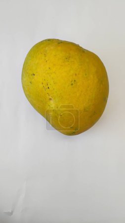 Closeup of beautiful greenish yellow and red color Mango fruit isolated on white background.