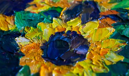 Photo for Smears of oil paints made with a palette knife. Sunflower painted with oil paints close-up - Royalty Free Image