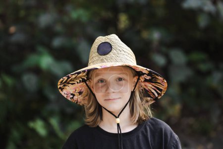 Photo for A young australian 11 year old girl wearing a sun smart wide brimmed hat - Royalty Free Image