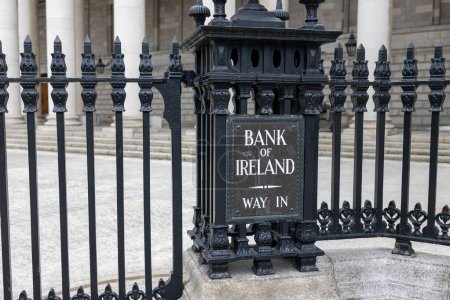 Entrance sign and door of Bank of Ireland. 