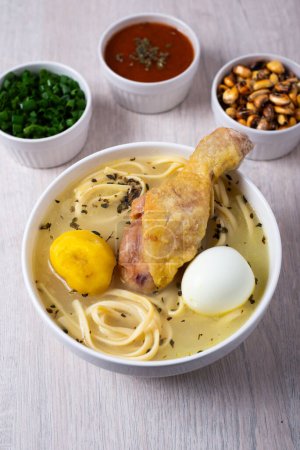 Photo for Experience Peru's culinary heritage with a classic chicken broth, showcasing the rich flavors of traditional Peruvian cuisine - Royalty Free Image