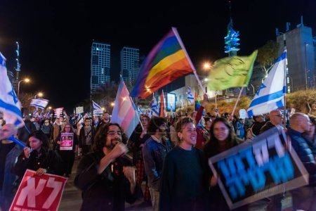 Photo for TEL AVIV, ISRAEL - January 21, 2023: Israelis protest in Tel Aviv against plans by prime minister Benjamin Netanyahu new government to trample the legal system and the supreme court. High quality - Royalty Free Image