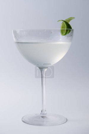 Photo for Alcoholic daiquiri drink garnished with lime skin, image for menu - Royalty Free Image