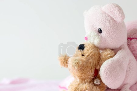 Photo for Teddy bear and brown dog are friends. - Royalty Free Image