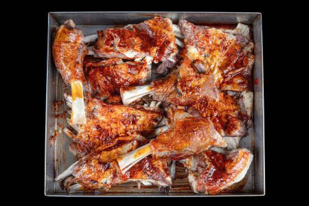 Photo for Baked shank (Turkish: incik, incik) on a tray ready to be served in the restaurant. Beef calf. Lamb shank fed with Grade A grass. Classic Turkish steakhouse shank favorite dish. - Royalty Free Image