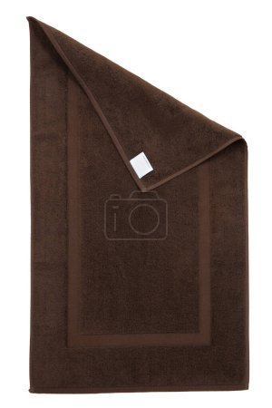 Brown bath foot towel 100% Cotton Terry Towels Isolated with White Background. Bath accessories. Top view.