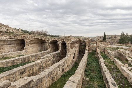 Photo for Dara Ancient City. Dara aqueducts, tare cisterns. Ancient Water Channels in the Ancient City of Dara in Mardin, Turkey. - Royalty Free Image