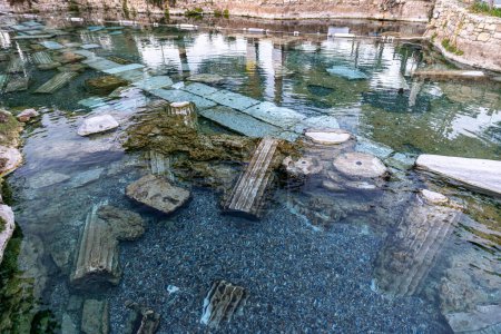 Cleopatra antique Pool in Hierapolis Ancient city. Antique pool (Cleopatra's Bath) in Pamukkale Denizli Turkey.