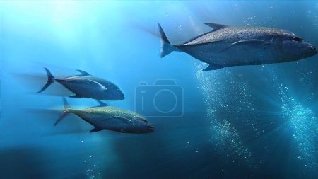 Foto de Fotografía submarina de peces Golden Trevally en el mar azul profundo. - Imagen libre de derechos