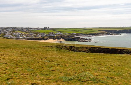 Landscape on a sunny April day. Beautiful view of the mountains and ocean. Padstow Cornwall, UK.
