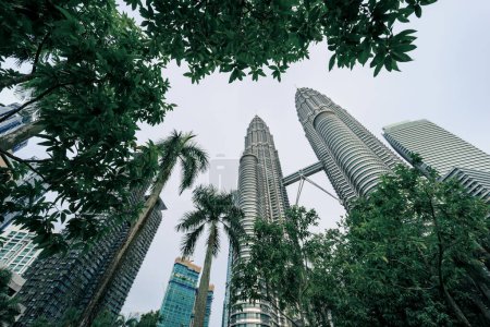 Photo for Petronas Twin Towers or KLCC Twin Towers, 88-storey supertall skyscrapers in Kuala Lumpur, a major landmark of the city, tourist destination. - Royalty Free Image