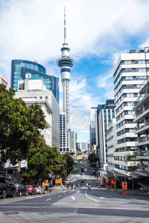 Photo for Auckland, new zealand. 17th february, 2023: street view of auckland city with sky tower at background - Royalty Free Image