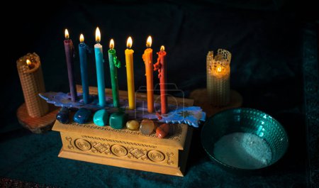 Téléchargez les photos : Energy healing, reiki session or chakra rituals with candles, wicca magic, new world, alternative medicine - en image libre de droit