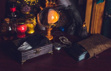 Photo for Concept of divination, predictions, crystal magic ball, paganism, wicca style - Royalty Free Image