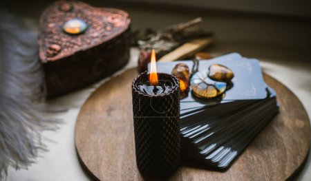 Photo for Magical attribute on a table, witchcraft concept, Candle fire, Spells and other rite - Royalty Free Image