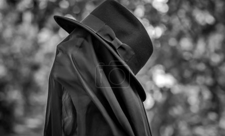 Photo for Woman in black, grief dark mood, melancholy and depression concept, lady cover black cloth - Royalty Free Image