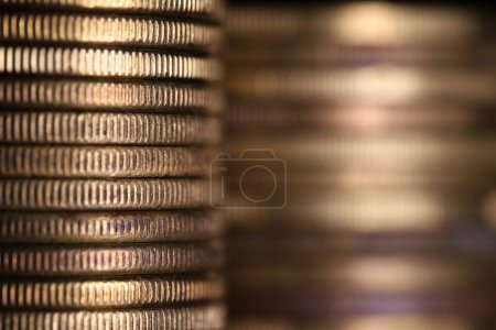 Stack of coins in close-up, texture of old coins