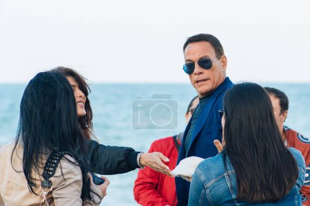 Photo for Bari, Puglia, Italy - September 27 2023: Belgian martial artist, actor, filmmaker, and fight choreographer Jean-Claude Van Damme shooting his new movie The serial killers wife 2 in Bari, Italy - Royalty Free Image