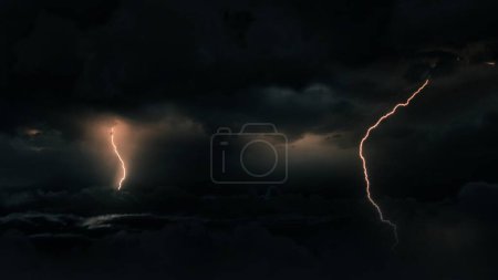 Dark tropical monsoon cyclone supercell thunderstorm. Aerial establishing bridging shot of storm clouds with lightning bolt strikes. Meteorology hurricane concept for extreme weather in climate change