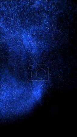 Foto de Enjambre abstracto de partículas estelares de flotabilidad líquida azul. Elegantes luces cósmicas festivas Fondo de ilustración 3D. Fondo de vacaciones mágicas verticales y polvo de hadas centelleante fondo de pantalla en cámara lenta. - Imagen libre de derechos