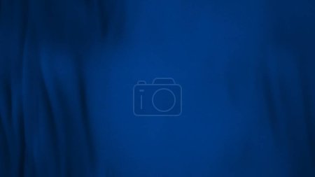 Téléchargez les photos : Tissu drapeau bleu en plein cadre avec mise au point sélective. Illustration 3D d'une couleur de vêtement bleu avec une texture satinée naturelle pure pour bannière de fond ou papier peint. - en image libre de droit