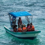Tourists in Caribbean Sea, the jungle and Tulum fortressMost idyllic and impressive places in Latin America are turquoise sea,Caribbean beaches,jungle and Tulum fortress
