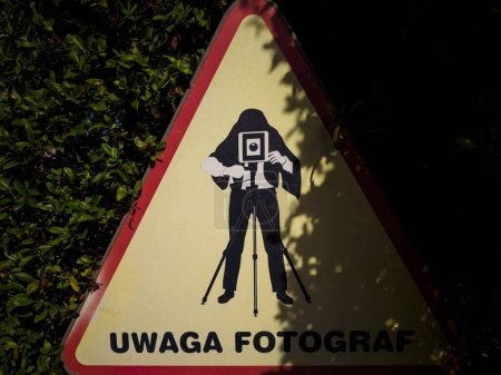 Photo for POLCZYN ZDROJ, WEST POMERANIAN - POLAND - 05 SEPTEMBER, 2023: Funny information board / A sign with the words "Attention Photographer" - Royalty Free Image
