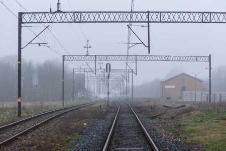 RAILWAY TRAIL - Foggy weather over transport infrastructure