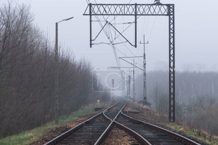 RAILWAY TRAIL - Foggy weather over transport infrastructure