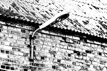 STREET LAMP - Very old and destroyed lantern on an old brick building with an asbestos roof
