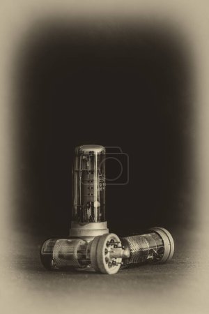 Photo for ELECTRON TUBE - A device in a closed glass housing used in electronic circuits to control the flow of electrons - Royalty Free Image
