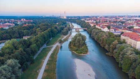 Photo for Isar river flowing through the city of Munich in a calm summer morning aerial image - Royalty Free Image