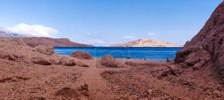 Photo for View of the beautiful sea landscape on a sunny day on the island of Pag, Croatia, Beritnica beach, mountain range on the island, in the background of the sea, photo - Royalty Free Image