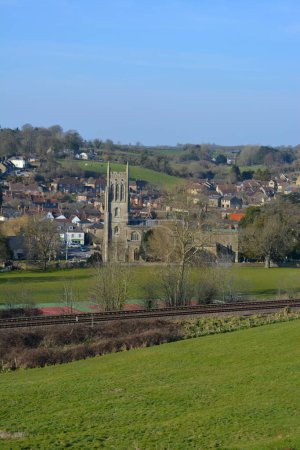 Photo for Bruton, Somerset, England. view to town and church from the dovecote, with railway tracks in foreground - Royalty Free Image