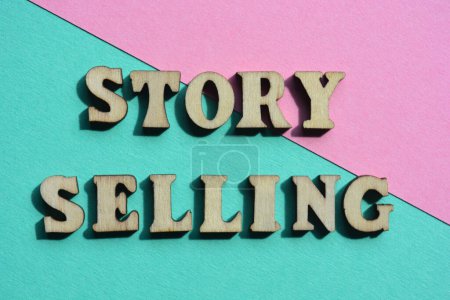 Photo for Story selling, words in wooden alphabet letters isolated on background as banner headline - Royalty Free Image