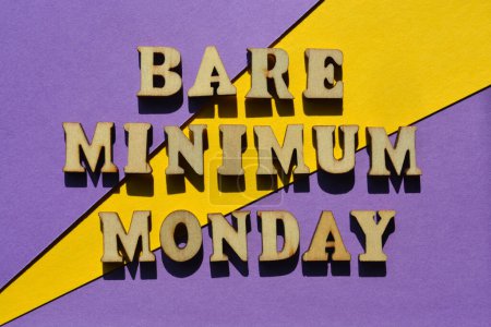 Photo for Bare Minimum Monday, words in wooden alphabet letters isolated on background - Royalty Free Image