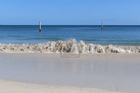 Photo for View from beach to horizon over sea  with a wave breaking on the seashore - Royalty Free Image