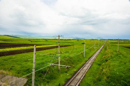 Photo for Rails view in Georgia, train road and station in Samtkhejavakheti Georgia - Royalty Free Image