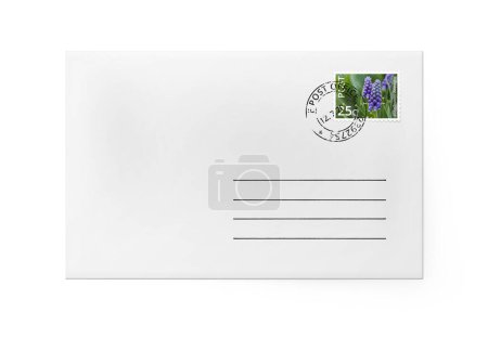 White paper envelope for letter - front side with stamp.