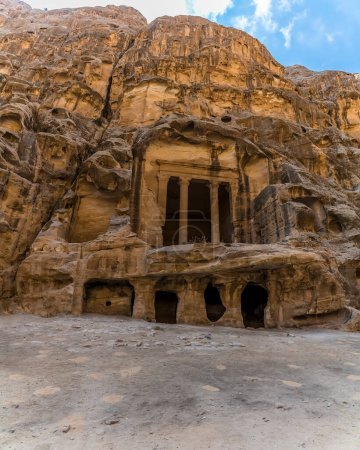 Photo for A view of abandoned temples and caves carved into the rock face in Little Petra, Jordan in summertime - Royalty Free Image