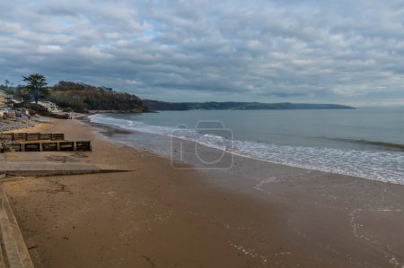 Photo for A view along the main beach in Saundersfoot, Wales in winter - Royalty Free Image
