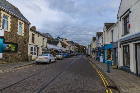 Photo for A view along the Strand road close to the beach in Saundersfoot, Wales in winter - Royalty Free Image