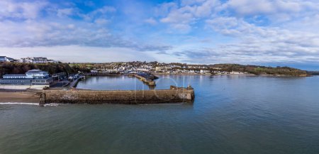 Photo for An aerial view towards the harbour and village of Saundersfoot, Wales in winter - Royalty Free Image