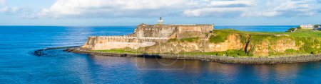 Photo for A panorama view across the harbour entrance and fortifications in San Juan, Puerto Rico on a bright sunny day - Royalty Free Image
