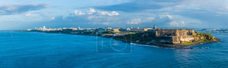 Photo for A panorama view of the harbour entrance fortifications and coastline in San Juan, Puerto Rico on a bright sunny day - Royalty Free Image